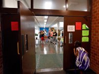 1009397793 ma nb HayMacFistDay  A student cautionsly enters the front door for the first day of school at the Hayden McFadden Elementary School in New Bedford.  PETER PEREIRA/THE STANDARD-TIMES/SCMG : education, school, students